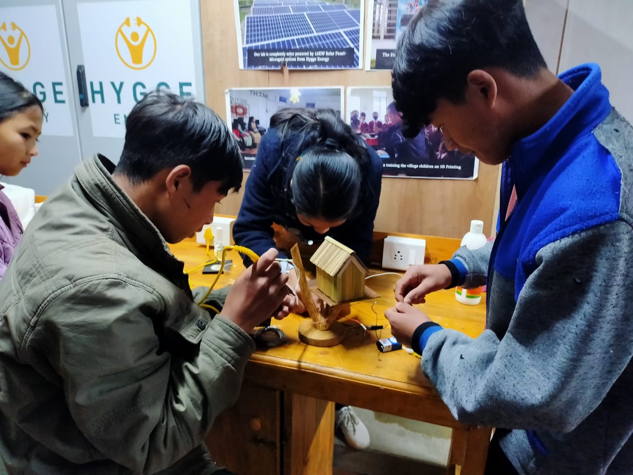 Girls working on technology projects at Curiosity Gym