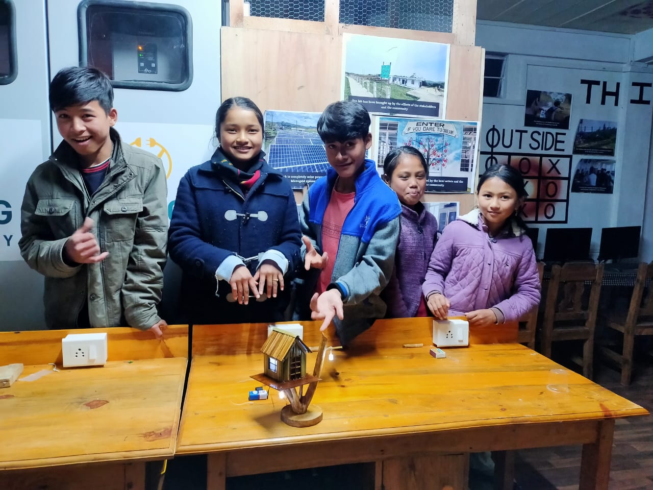 Girls collaborating on an engineering challenge at Curiosity Gym