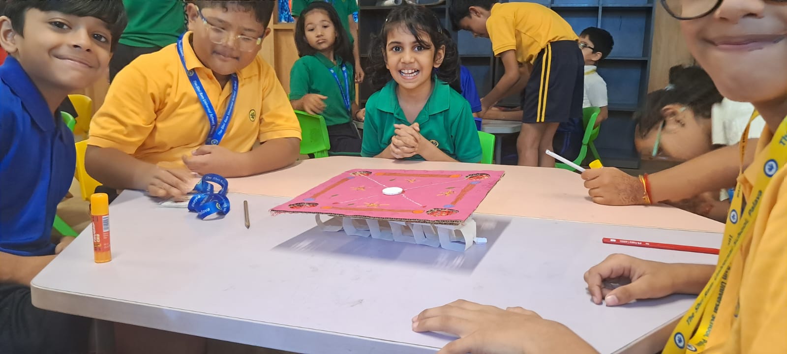 Girls engaged in a science project at Curiosity Gym